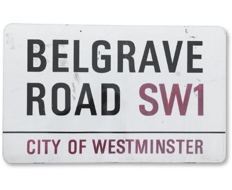 An enamelled iron street sign for Belgrave Road SW1, City of Westminster, with iconic and black and red sans serif lettering 