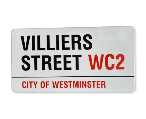 An enamelled iron street sign for Villiers Street WC2, City of Westminster with iconic black and red sans serif lettering fir