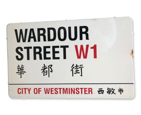 An enamelled iron street sign for Wardour Street W1 Chinatown, City of Westminster with iconic black and red sans serif lette