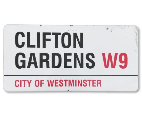 An enamelled iron street sign for Clifton Gardens W9, City of Westminster, with iconic and black and red sans serif lettering