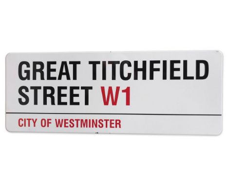 An enamelled iron street sign for Great Titchfield Street W1, City of Westminster with iconic black and red sans serif letter