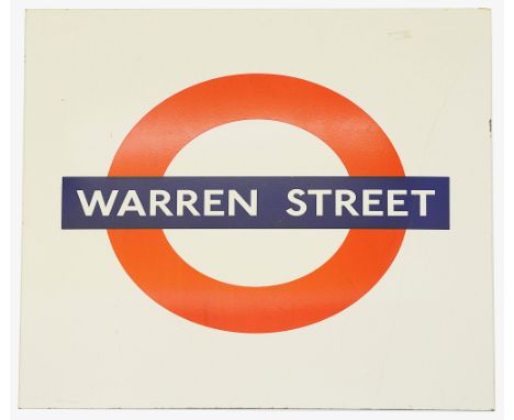 A London Underground enamel station roundel for Warren Streetheight 64cm, width 64cmCondition: large black mark running acros