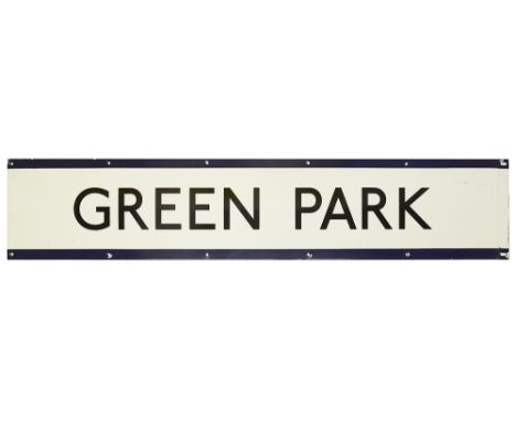 A London Underground enamel station frieze sign for Green Park,black lettering on white ground with blue edging for the Picca