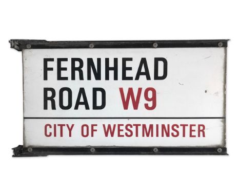 A double sided enamel street sign on brackets for Fernhead Road W9, City of Westminster with iconic black and red sans serif 
