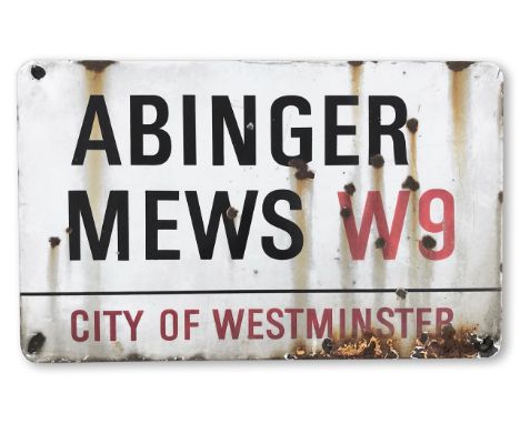 An enamelled iron street sign for Abinger Mews W9, City of Westminster, with iconic and black and red sans serif lettering fi