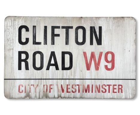 An enamelled iron street sign for Clifton Road W9, City of Westminster, with iconic and black and red sans serif lettering fi