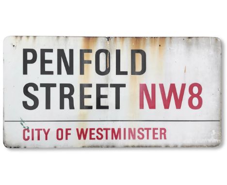 An enamelled iron street sign for Penfold Street NW8, City of Westminster, with iconic and black and red sans serif lettering