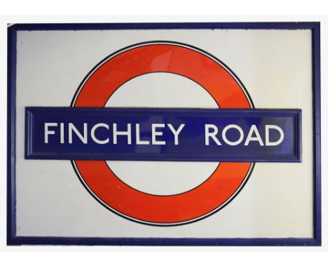 A large timber framed London Underground enamel sign for Finchley Road,mid-20th century, with outlined roundel on white groun