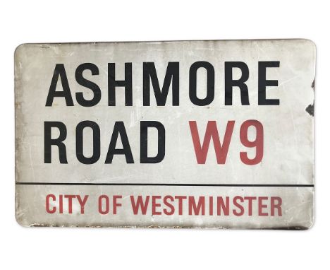 An enamelled iron street sign for Ashmore Road W9, City of Westminster with iconic black and red sans serif lettering first c
