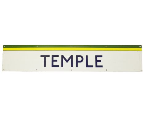 A London Underground enamel station frieze sign for Temple,with blue lettering on a white ground and green and yellow top edg