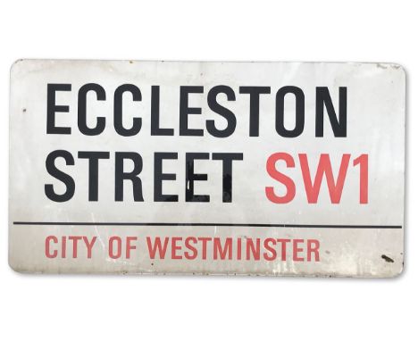 An enamelled iron street sign for Eccleston Street SW1, City of Westminster with iconic black and red sans serif lettering fi