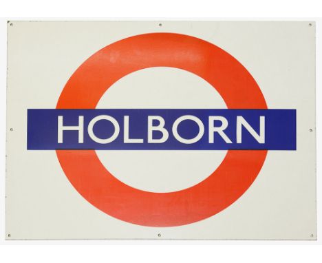 A London Underground enamel station roundel for Holbornheight 56.1cm, width 70.8cmCondition: in good condition, some slight s