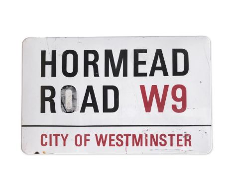 An enamelled iron street sign for Hormead Road W9, City of Westminster with iconic black and red sans serif lettering first c