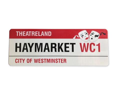 An enamelled iron street sign for Haymarket WC1 Theatreland, City of Westminster with iconic black and red sans serif letteri