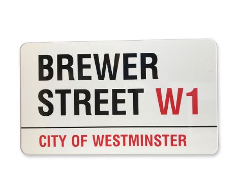 An enamelled iron street sign for Brewer Street W1, City of Westminster with iconic black and red sans serif lettering first 