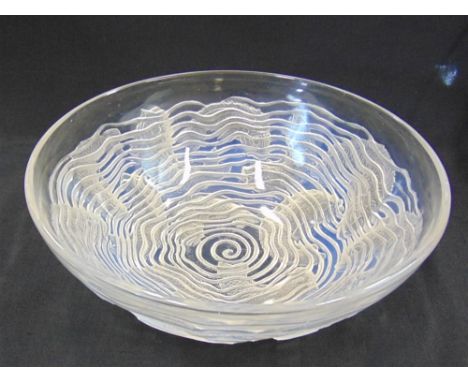 A RENE LALIQUE GLASS 'DAUPHINS' PATTERN BOWL  decorated with swimming fish, acid etched 'R LALIQUE FRANCE' to base, 23.5cm di