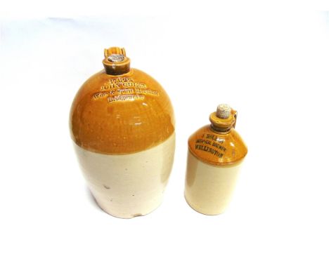 TWO STONEWARE BOTTLES  the first impressed '17922 / JOHN QUIER / Wine & Spirit Merchant / Bridgewater', 39.5cm high; the seco