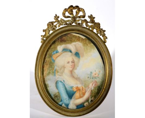 CONTINENTAL SCHOOL (20TH CENTURY)  Miniature Portrait of a Lady,  oil on ivorine, indistinctly signed Mevy?, 10.5cm x 8.5cm (