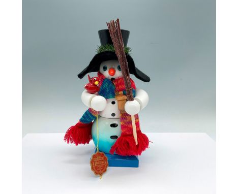 Handcraft and hand painted figure of a snowman wrapped in a wool scarf, and large black top hat. When the top and middle of t