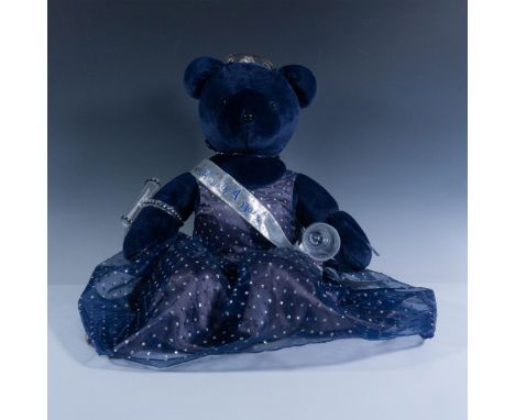 Limited edition. Issued in celebration of the Year 2000. The bear features a velvet fur and its dressed in a beautiful blue s