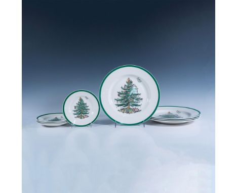 Perfect for the holidays with the green rim and decorated tree in center with presents. Set includes 4 dinner plates 11" and 