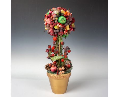 The topiary tree is covered with frosted fruit and berries and stands in a gold-painted pot. This item has its original box w