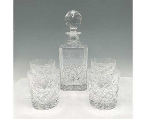Clear crystal with crisscross and fan cut pattern. Set includes decanter with round cut stopper 10.25"H, and 4 Whiskey Tumble