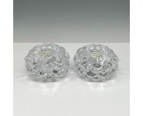 Crystal design of stacked drupelets creates these visually soft and appealing holders. Orrefors mark. This item has its origi