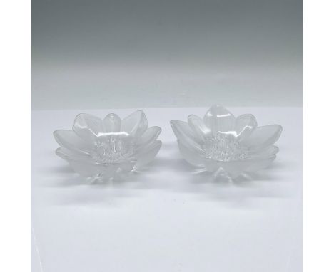 A set of two frosted and textured crystal candle holders in a shape of a flower. This item has its original box: 5"L x 4.75"W