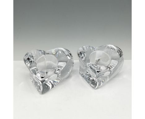 Simple but elegant clear crystal heart with center holder. Orrefors mark. Issued: 21st centuryDimensions: 4"L x 4"W x 2.25"HM