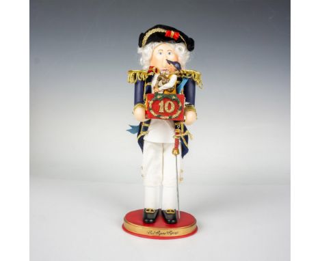 Handcrafted and hand painted Christmas figure. Depicts King William IV, reign from 1830-1837, holding a box for Ten Pipers Pi