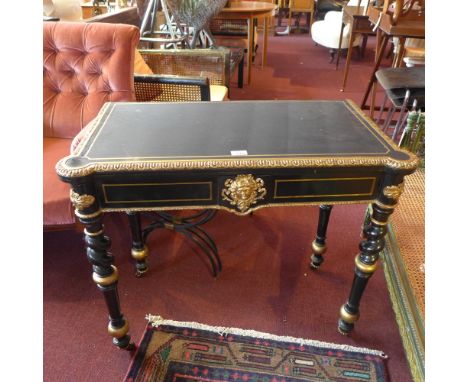 SOLD IN TIMED AUCTION-A 19th Century ebonised foldover card table having ormolu mounts with egg and dart, mask and acanthus l