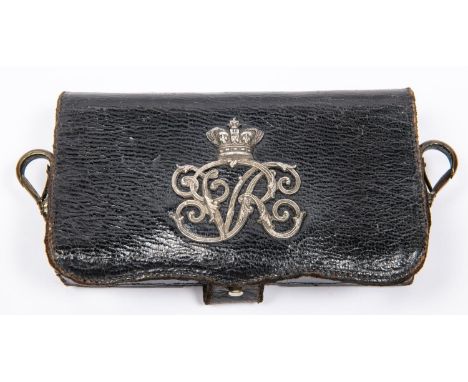 A Victorian officers' leather cartridge pouch, with silver crowned "VR" badge and brass spring clip fittings. GC £50-60 