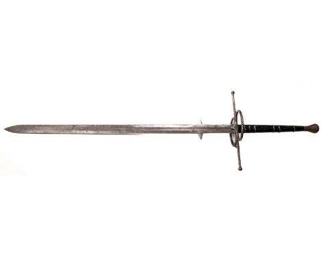 A good quality copy of a large double handed mediaeval sword, 47" double edged blade with armourer's marks, leather covered g