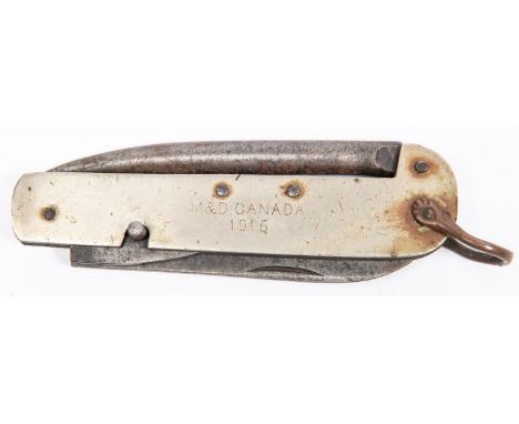 A WWI Canadian army clasp knife, with 3½" blade, 4" spike, and can opener, the sideplates of nickel silver, one side stamped 