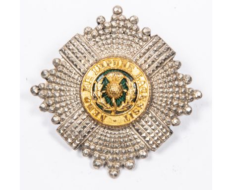 A Scots Guards officer's silver, gilt and enamel cap badge, the back stamped "S". VGC £40-50 