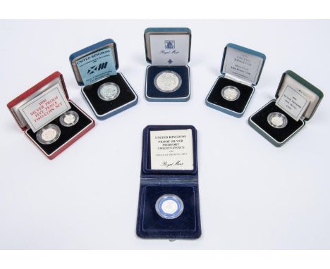 Elizabeth II: silver proof commemorative issue £2 1986 Commonwealth Games issue; Silver proof £1 coin 1999 Scottish device; S