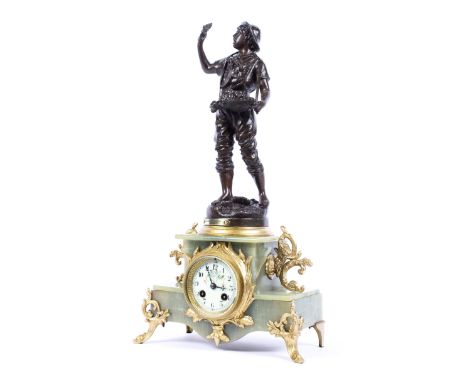 A French onyx and gilt-metal mounted mantle clock, the ivorine dial with black Arabic numerals and floral decoration, with tw