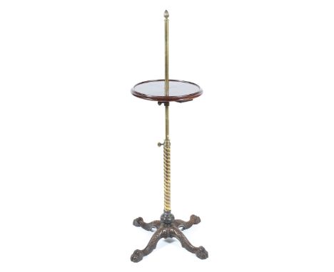 A 19th century brass and iron adjustable etegere with circular mahogany tray