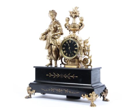 A gilt and slate mantle clock, with a figure of a man to side 34cm length x 14cm wide x 43cm high