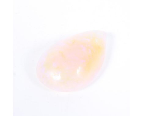 A large free cut opal, white with blue and yellow phenomena, approximately 75cts 
