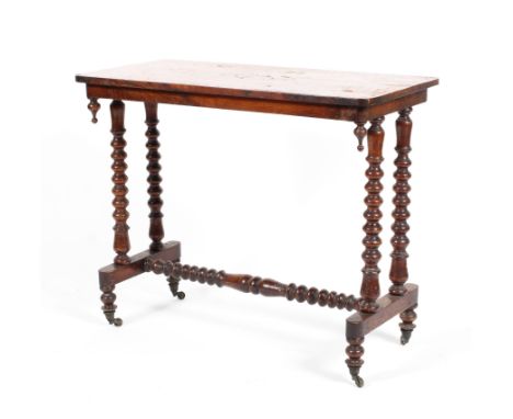 A Victorian inlaid walnut topped side table, the top inlaid with butterflies and sprays of flowers, raised on bobbin turned m