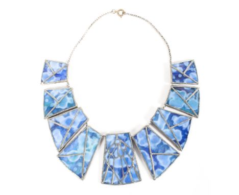 Louis Vuitton. A glass and white metal abstract panel necklace. in original box with LV sleeve. 