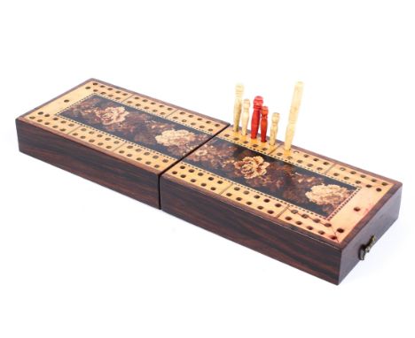 A wooden Tunbridge ware cribbage board 12cm length x 8cm wide x 5cm high Condition Report: Slight ink stain to one corner, sl