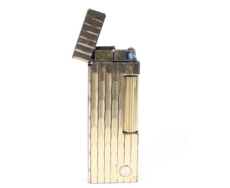 A gold plated Rollagas Dunhill engine turned lighter. 