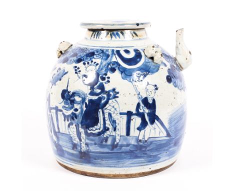 A large Chinese ceramic wine vessel and lid decorated in blue and white with a dignitary astride a Fo lion and accompanied by