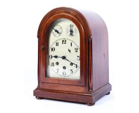 A Mauthe (German) mahogany striking eight day mantle clock, early 20th century, with arched rectangular reeded case, the silv