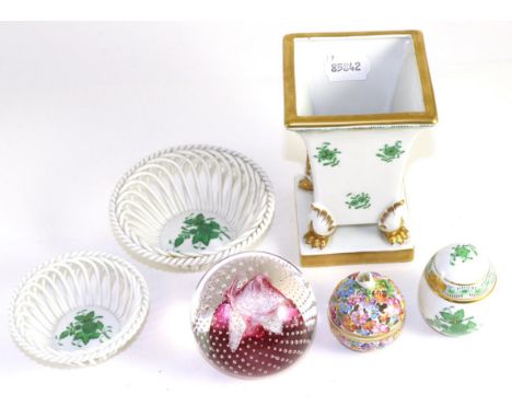 A Herend porcelain bowl, two Herend porcelain baskets, a Herend porcelain egg form box and a small Herend covered box, togeth