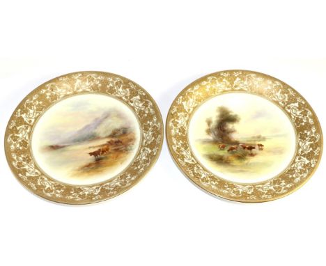 A pair of Royal Worcester porcelain plates, 1912, painted by Harry Stinton, 22.7cm Minor wear to gilding. One with noticeable