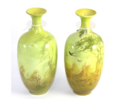 A pair of Royal Worcester vases signed Sedgeley (both restored)